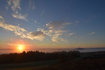 A sunrise on an autumn morning by Claude Laprise