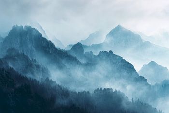 Misty blue between mountain peaks