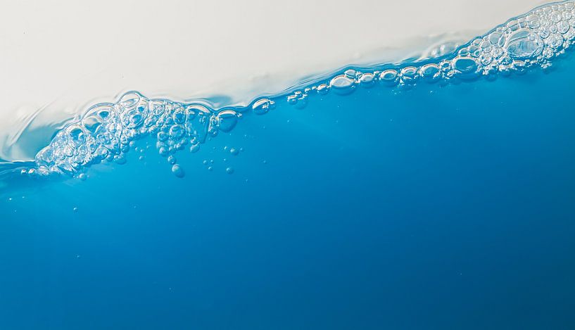 slanting blue water by Guido Akster