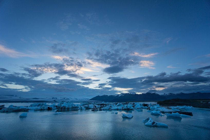 Iceland - Night over glacier lagoon joekulsarlon with many ice floes by adventure-photos