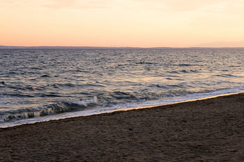Gentle Waves at Sunset – Greece