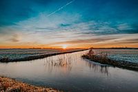 Zonsopkomst in een winters Friesland