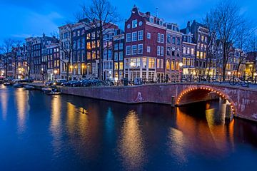 Stadsgezicht van Amsterdam aan de Keizersgracht bij zonsondergang van Eye on You
