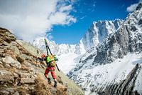 Climber with Ski's Approaching Grand Jorasses  