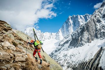 Climber with Ski's Approaching Grand Jorasses  