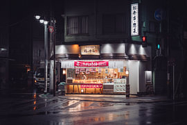 Croquette stall in the rain by Studio Graber