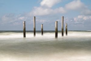 Poles in the sea by Mark Bolijn