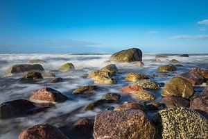 Stones on shore of the Baltic Sea van Rico Ködder