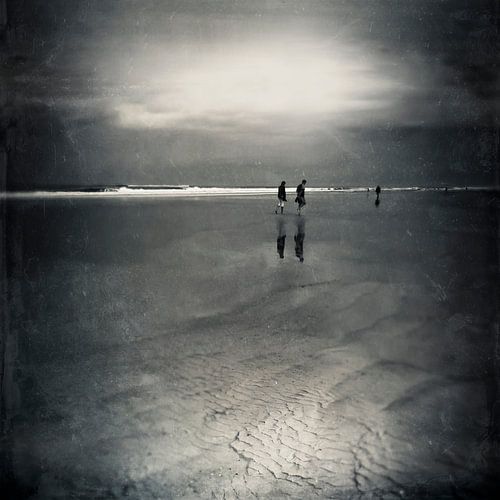 Silver lining on the horizon - People on the beach