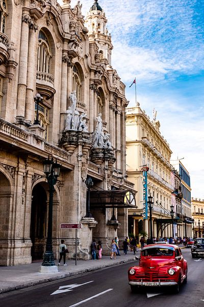 red oldtimer in old town street near Gran Teatro of Havana Cuba by Dieter Walther