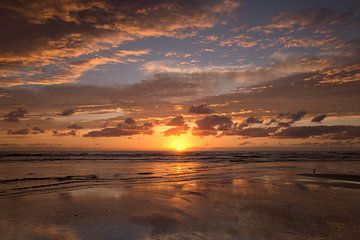 Zonsondergang aan zee