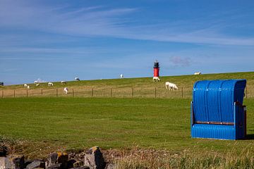 Beach chair at the dike of Pellworm by Alexander Wolff