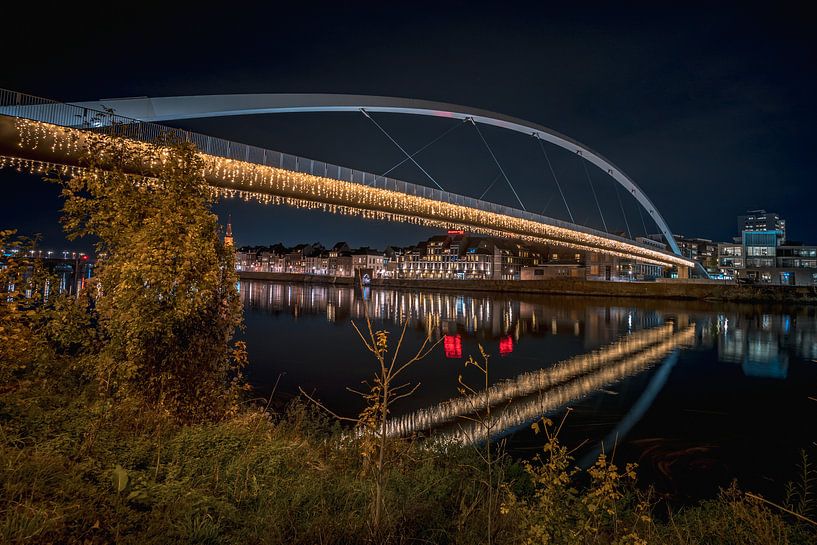 Bridge in Maastricht in the evening by Maurice Meerten