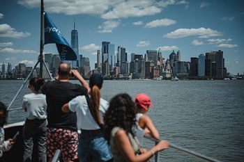 Tourists view New York skyline on a boat