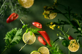 A striking, colourful still life of ingredients for, say, a fresh salad by Annet van Esch