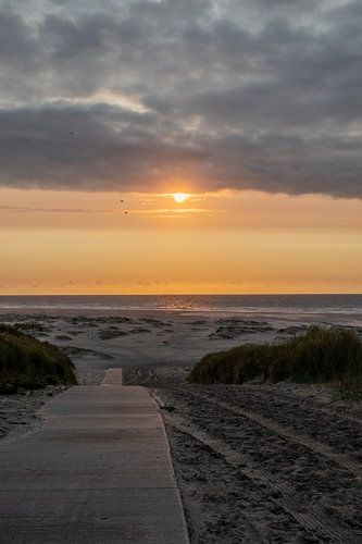 Sunset on the island of Terschelling, pastel colours on the beach