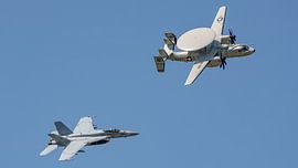 U.S. Navy E-2D Hawkeye and F/A-18 Super Hornet. by Jaap van den Berg