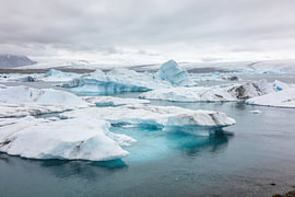 Glacier Lagoon – Icebergs in Cool Blue by Albert Klee