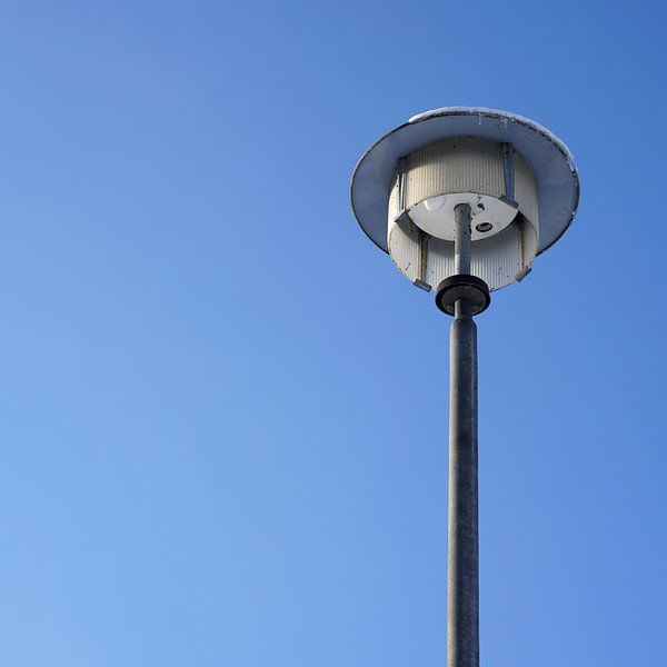 old streetlamp and blue sky by Heiko Kueverling