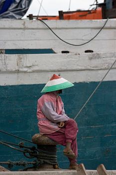 Fisherman at the wharf of Jakarta, Java.
