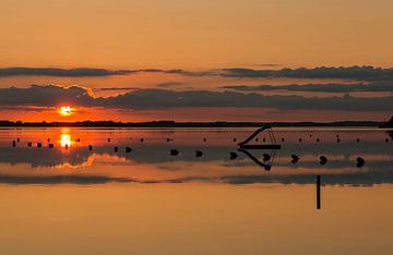 zonsondergang met waterglijbaan van Corrie Ruijer