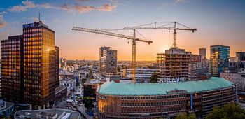 Coolsingel met zonsondergang