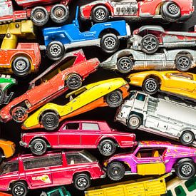 Stack of colourful toy cars by Wijnand Loven