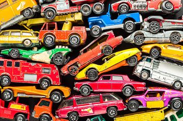 Stack of colourful toy cars by Wijnand Loven