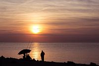 Angler in the sunset Fehmarn