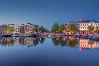 Reflections in the Amstel river in Amsterdam