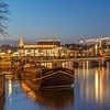 Le pont Skinny et la rivière Amstel à Amsterdam le soir - 1 sur Tux Photography