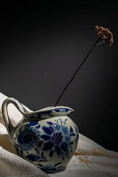 Delft blue jug with an autumn branch by Aan Kant