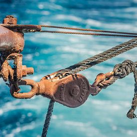 Pulley above water by Maurice Welling