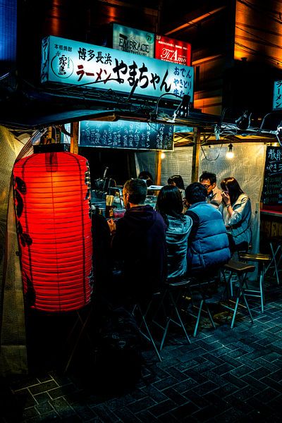 Eatery during the evening in Fukuoka by Mickéle Godderis