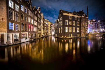 Maisons de canal sur la digue de mer à Amsterdam sur Fotografiecor .nl