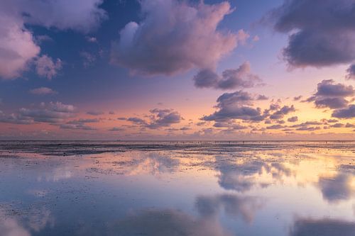 Dutch skies over the Frisian mudflats by Jurjen Veerman