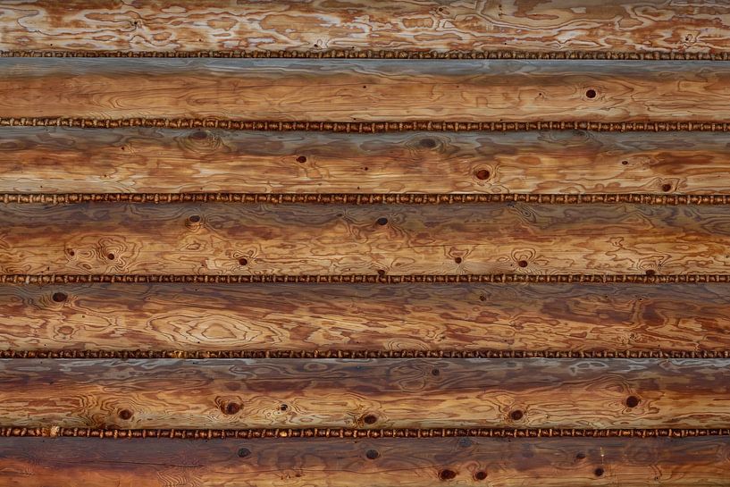 Traditionelle Holzblockhauswand von AS Photography