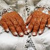 Traditional wedding dress with tattooed henna hands by Shot it fotografie