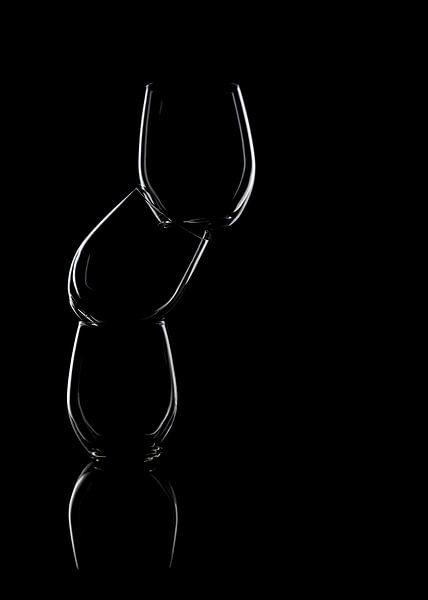Glasses stacked on a black background - isolated by Jolanda Aalbers