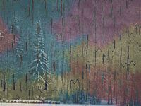 Trees in winter against a geometric, colourful background