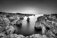 Coastal landscape at the Algarve in Portugal. Black and white image.