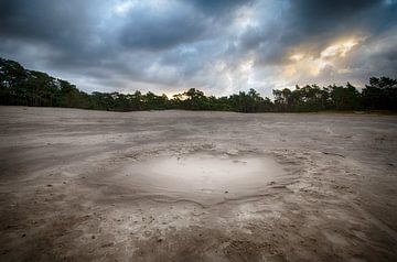 Krater in het zand