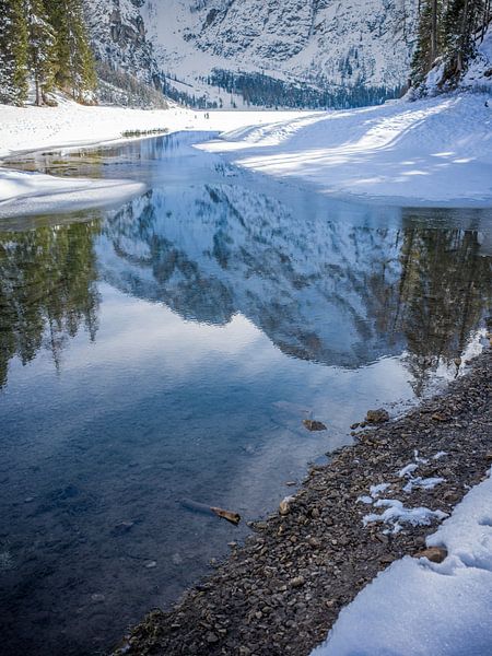 A mountain peak is reflected in Lake Braies by t.ART