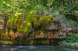 beautiful waterfall on a moss covered rock in luxembourg by ChrisWillemsen