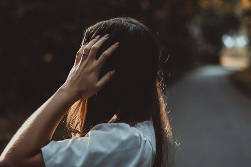 Thinking woman or girl in the beauty of the nature