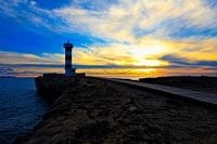 Zonsondergang met vuurtoren