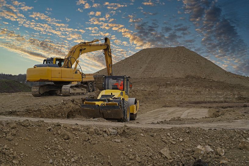Excavator and roller in action by Babetts Bildergalerie