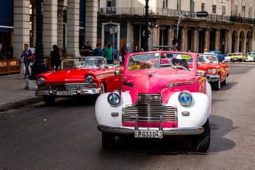 Convertible oldtimer in street of the old town of Havana Cuba by Dieter Walther
