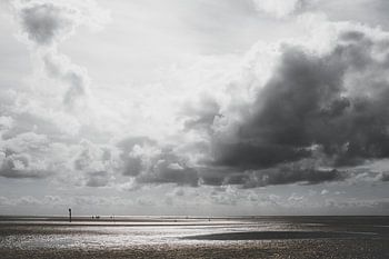mudflats, clouds and sea