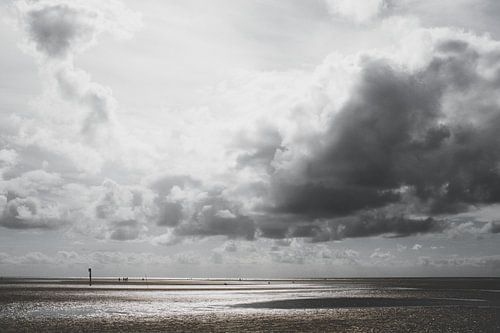 mudflats, clouds and sea
